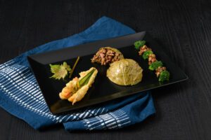 Cabri en farci de feuilles de Vigne